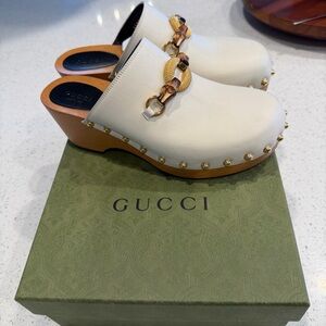 Gucci Ivory Leather Clogs with Gold Accents